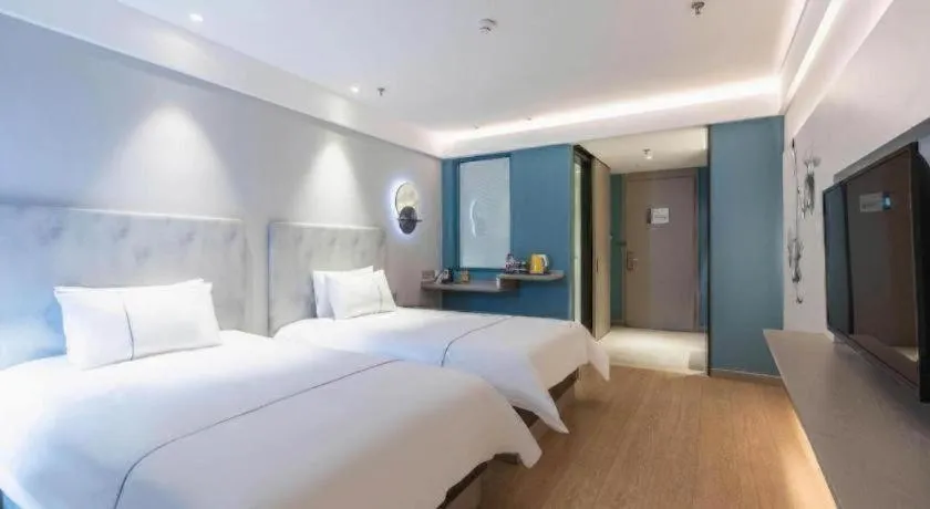 Bed in Magnotel Hotel Suzhou Wanda Plaza Huaihai Road