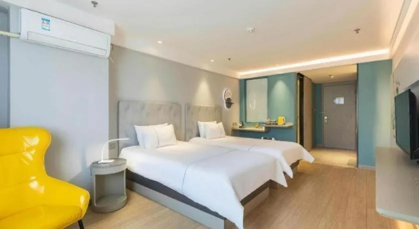 Bed in Magnotel Hotel Suzhou Wanda Plaza Huaihai Road