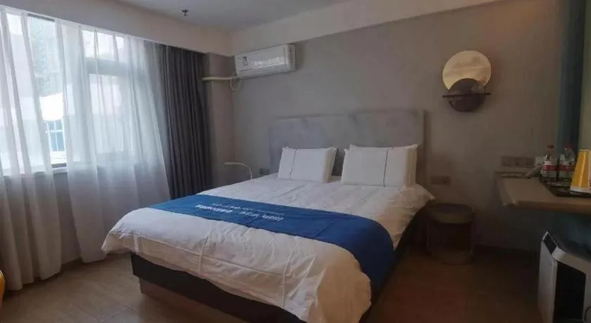 Bed in Magnotel Hotel Suzhou Wanda Plaza Huaihai Road
