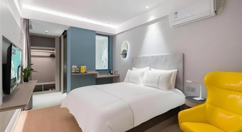 Bed in Magnotel Hotel Suzhou Wanda Plaza Huaihai Road