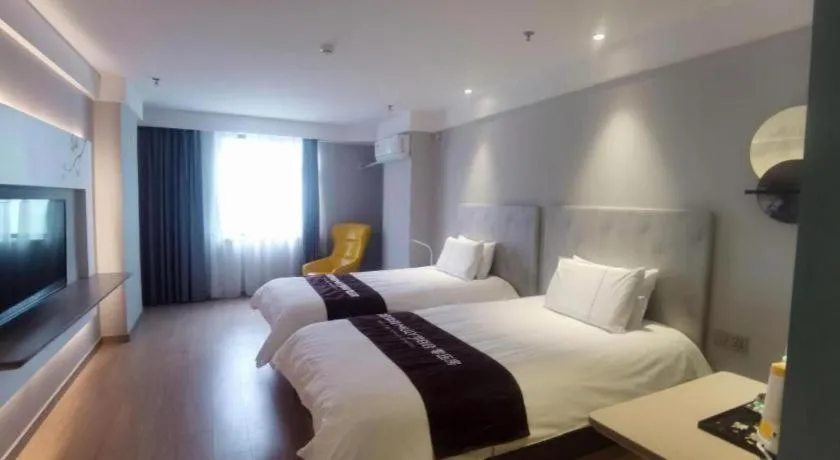 Bed in Magnotel Hotel Suzhou Wanda Plaza Huaihai Road