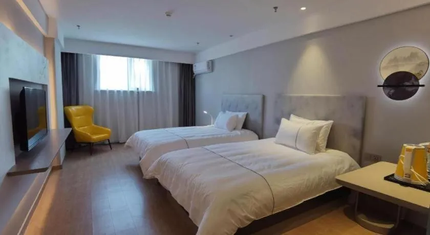 Bed in Magnotel Hotel Suzhou Wanda Plaza Huaihai Road