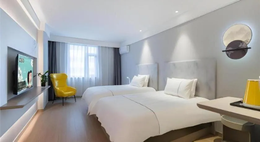 Bed in Magnotel Hotel Suzhou Wanda Plaza Huaihai Road