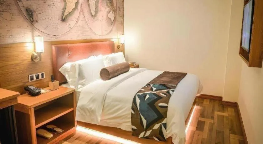 Bed in James Joyce Coffetel Luoyang Longmen High-speed Railway Station Baolong Plaza