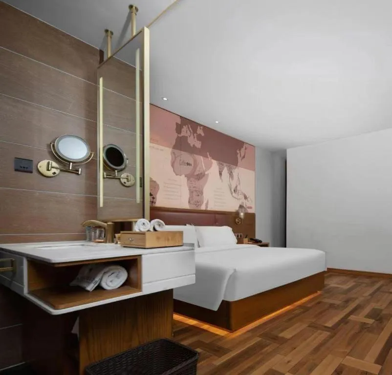 Bed in James Joyce Coffetel Luoyang Longmen High-speed Railway Station Baolong Plaza