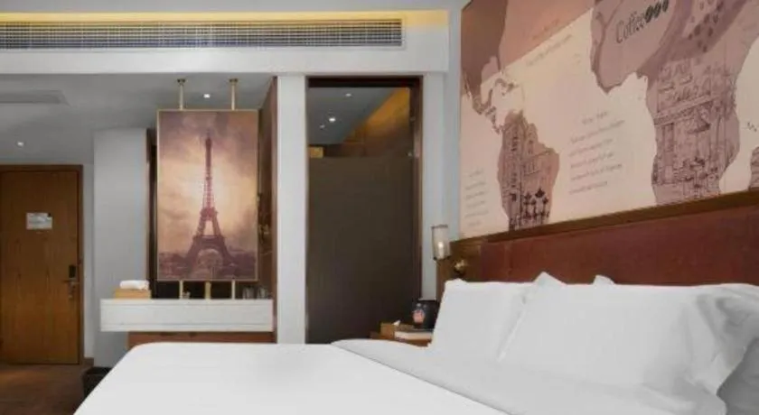 Bed in James Joyce Coffetel Luoyang Longmen High-speed Railway Station Baolong Plaza