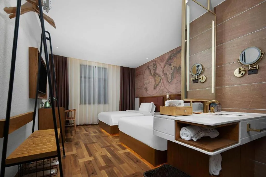 Bed in James Joyce Coffetel Luoyang Longmen High-speed Railway Station Baolong Plaza