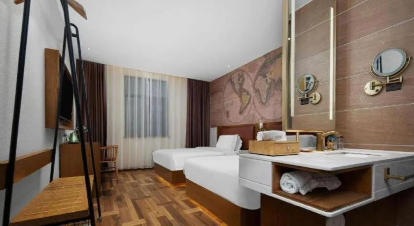 Bed in James Joyce Coffetel Luoyang Longmen High-speed Railway Station Baolong Plaza