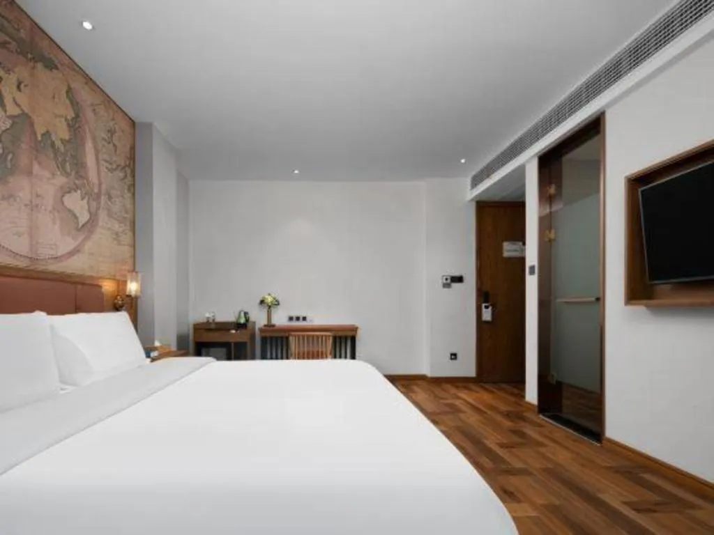 Bed in James Joyce Coffetel Luoyang Longmen High-speed Railway Station Baolong Plaza