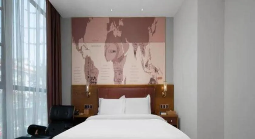 Bed in James Joyce Coffetel Luoyang Longmen High-speed Railway Station Baolong Plaza