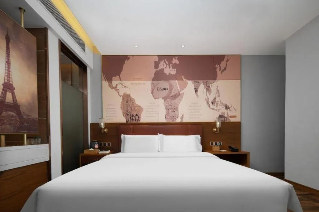 Bed in James Joyce Coffetel Luoyang Longmen High-speed Railway Station Baolong Plaza