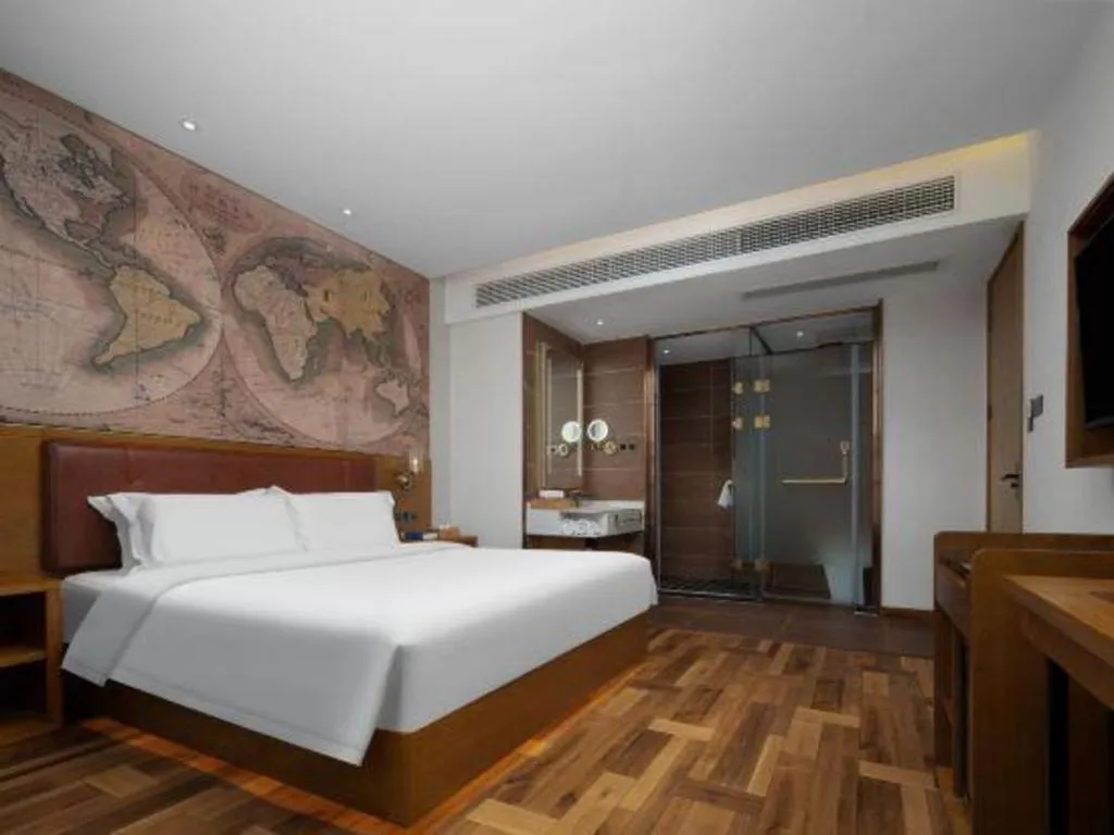 Bed in James Joyce Coffetel Luoyang Longmen High-speed Railway Station Baolong Plaza