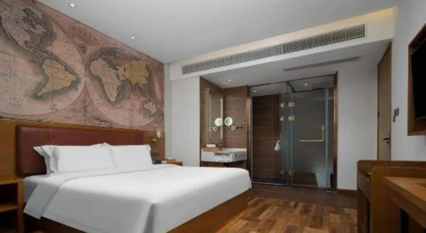 Bed in James Joyce Coffetel Luoyang Longmen High-speed Railway Station Baolong Plaza