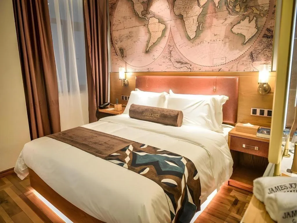 Bed in James Joyce Coffetel Luoyang Longmen High-speed Railway Station Baolong Plaza