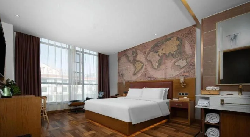 Bed in James Joyce Coffetel Luoyang Longmen High-speed Railway Station Baolong Plaza