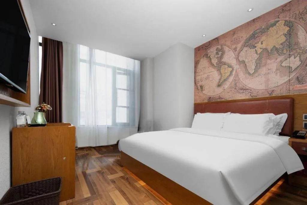 Bed in James Joyce Coffetel Luoyang Longmen High-speed Railway Station Baolong Plaza