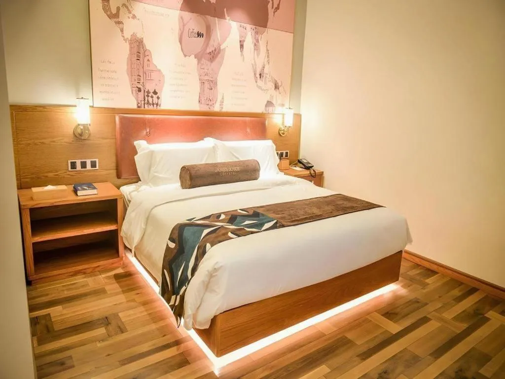 Bed in James Joyce Coffetel Luoyang Longmen High-speed Railway Station Baolong Plaza