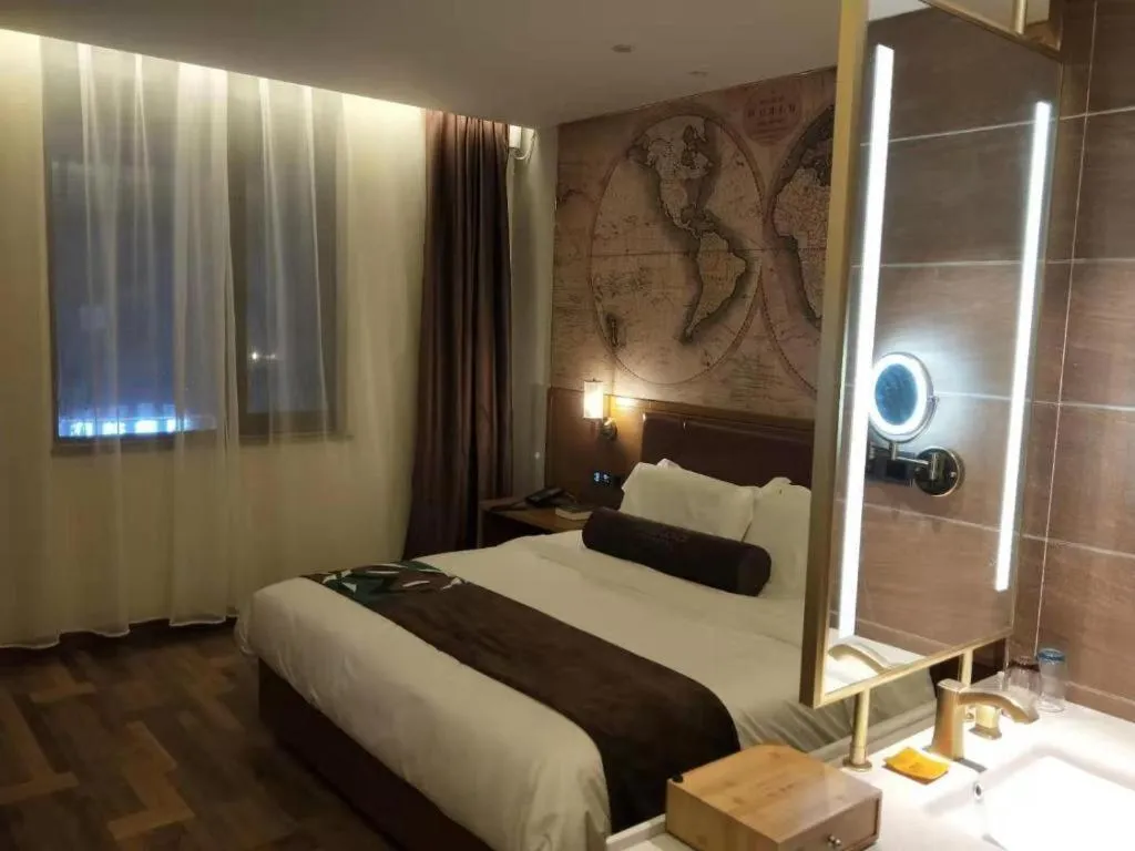 Bed in James Joyce Coffetel Luoyang Longmen High-speed Railway Station Baolong Plaza