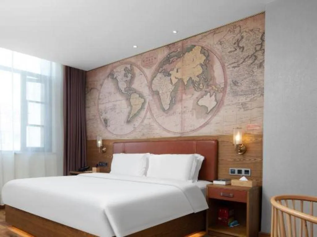 Bed in James Joyce Coffetel Luoyang Longmen High-speed Railway Station Baolong Plaza