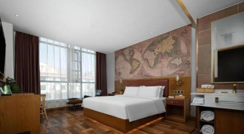 Bed in James Joyce Coffetel Luoyang Longmen High-speed Railway Station Baolong Plaza