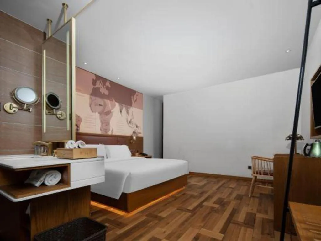 Bed in James Joyce Coffetel Luoyang Longmen High-speed Railway Station Baolong Plaza