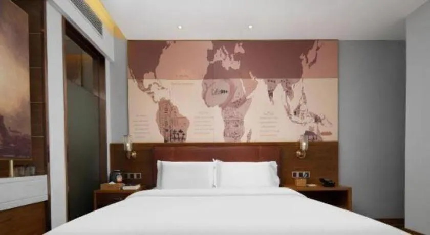 Bed in James Joyce Coffetel Luoyang Longmen High-speed Railway Station Baolong Plaza