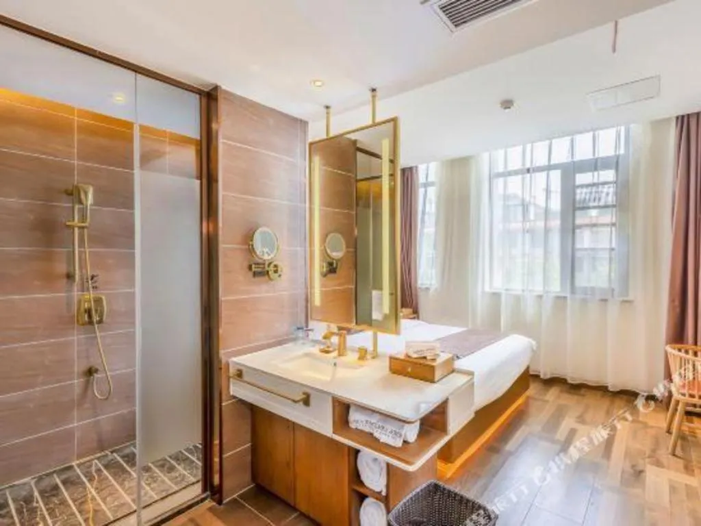 Bed in James Joyce Coffetel Luoyang Longmen High-speed Railway Station Baolong Plaza