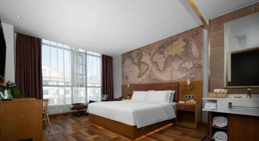 Bed in James Joyce Coffetel Luoyang Longmen High-speed Railway Station Baolong Plaza