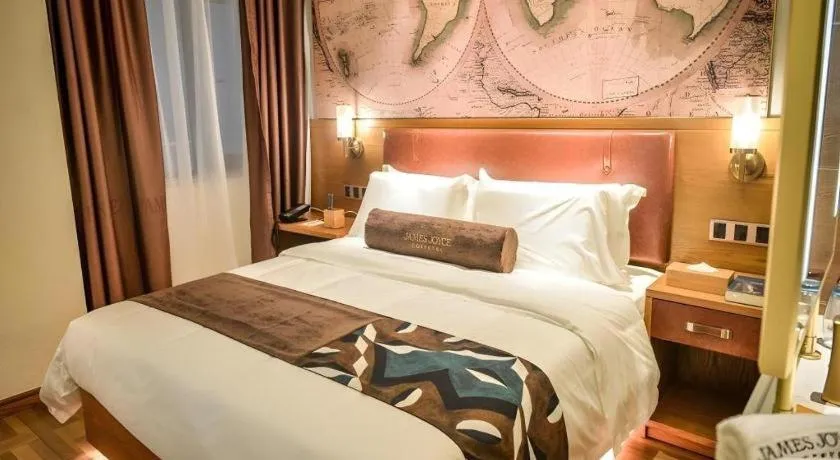 Bed in James Joyce Coffetel Luoyang Longmen High-speed Railway Station Baolong Plaza