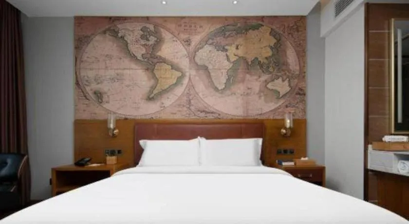 Bed in James Joyce Coffetel Luoyang Longmen High-speed Railway Station Baolong Plaza