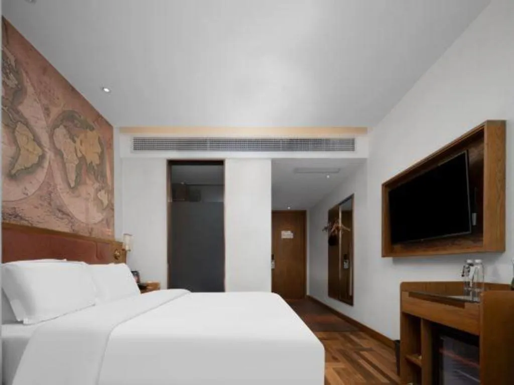 Bed in James Joyce Coffetel Luoyang Longmen High-speed Railway Station Baolong Plaza