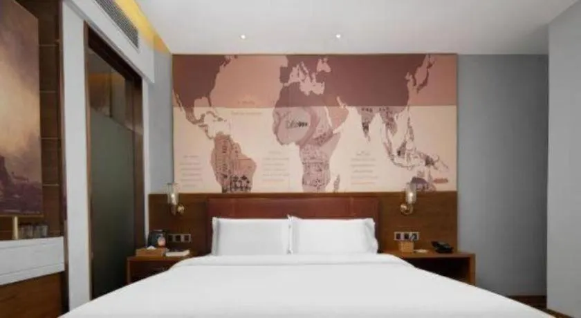 Bed in James Joyce Coffetel Luoyang Longmen High-speed Railway Station Baolong Plaza