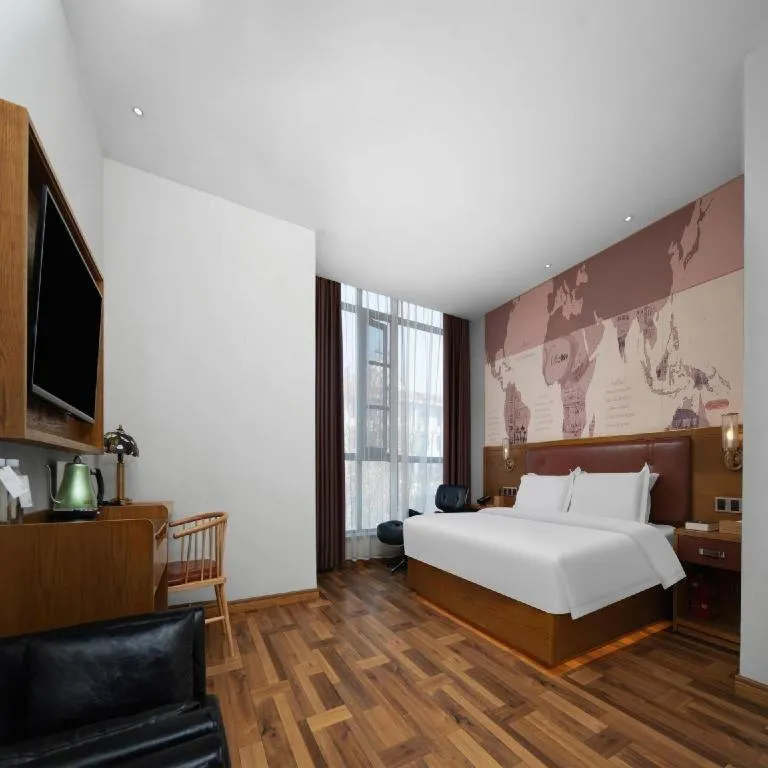 Bed in James Joyce Coffetel Luoyang Longmen High-speed Railway Station Baolong Plaza