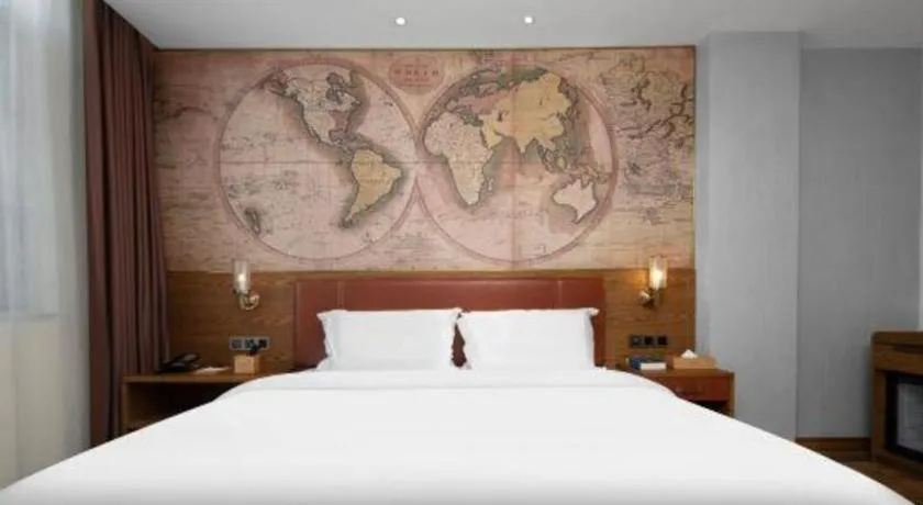 Bed in James Joyce Coffetel Luoyang Longmen High-speed Railway Station Baolong Plaza