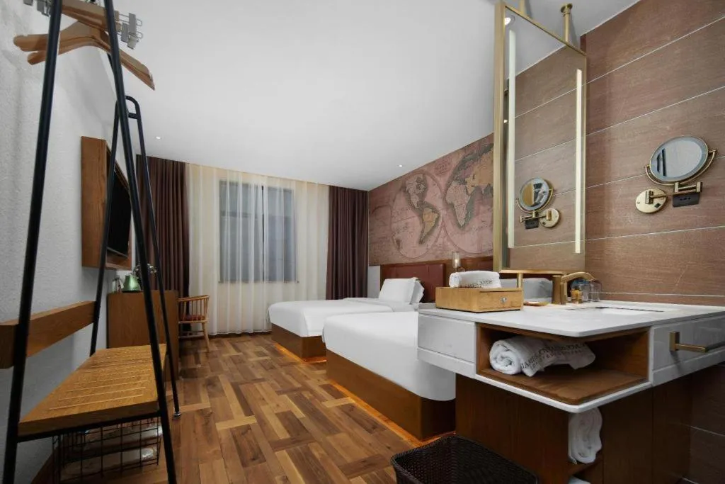 Bed in James Joyce Coffetel Luoyang Longmen High-speed Railway Station Baolong Plaza