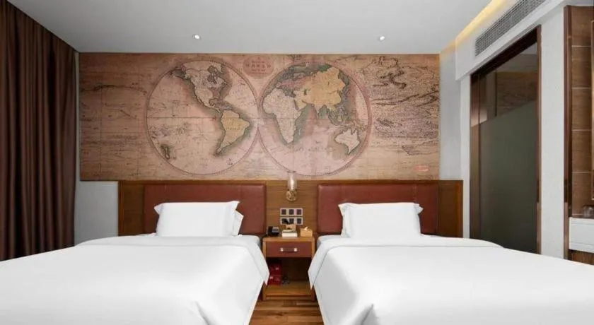 Bed in James Joyce Coffetel Luoyang Longmen High-speed Railway Station Baolong Plaza