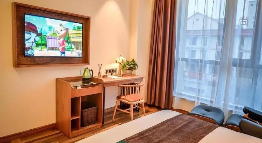 Bed in James Joyce Coffetel Luoyang Longmen High-speed Railway Station Baolong Plaza