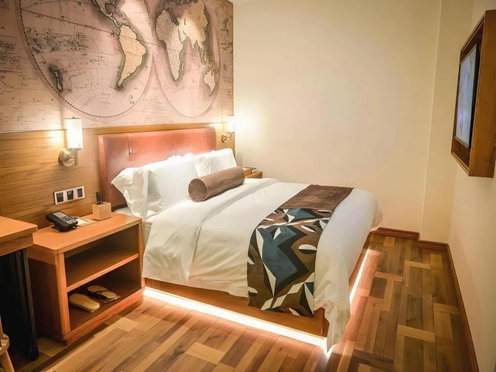 Bed in James Joyce Coffetel Luoyang Longmen High-speed Railway Station Baolong Plaza