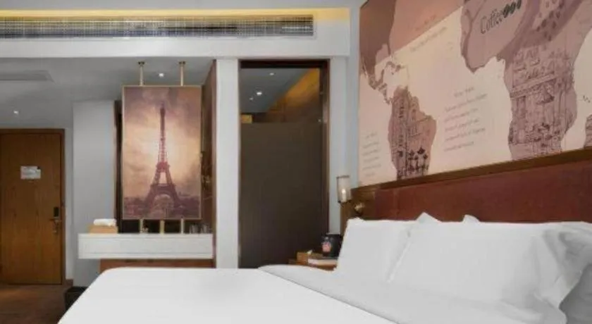 Bed in James Joyce Coffetel Luoyang Longmen High-speed Railway Station Baolong Plaza