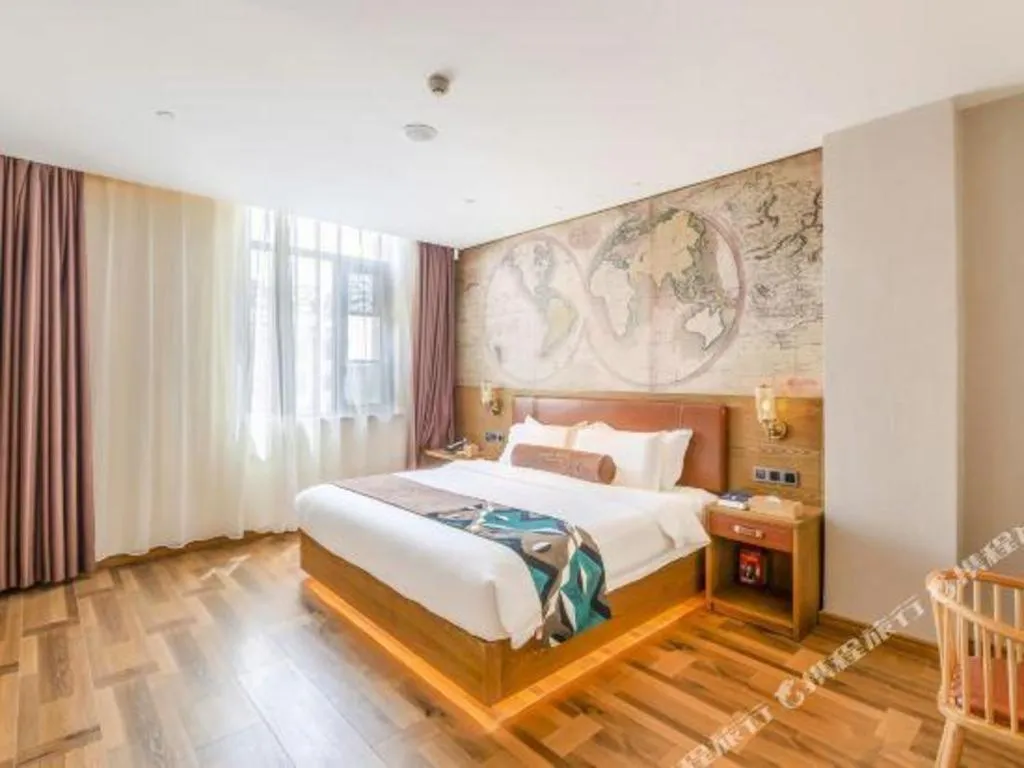 Bed in James Joyce Coffetel Luoyang Longmen High-speed Railway Station Baolong Plaza