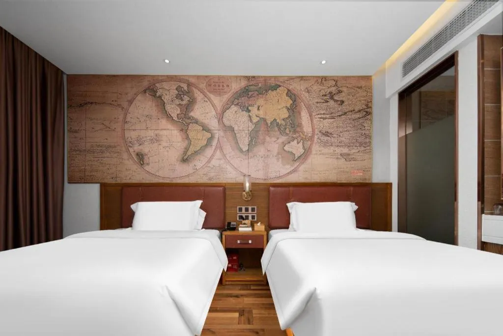 Bed in James Joyce Coffetel Luoyang Longmen High-speed Railway Station Baolong Plaza