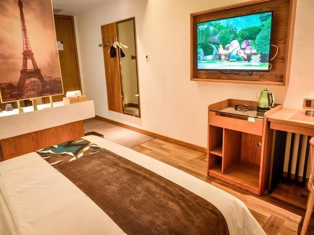 Bed in James Joyce Coffetel Luoyang Longmen High-speed Railway Station Baolong Plaza