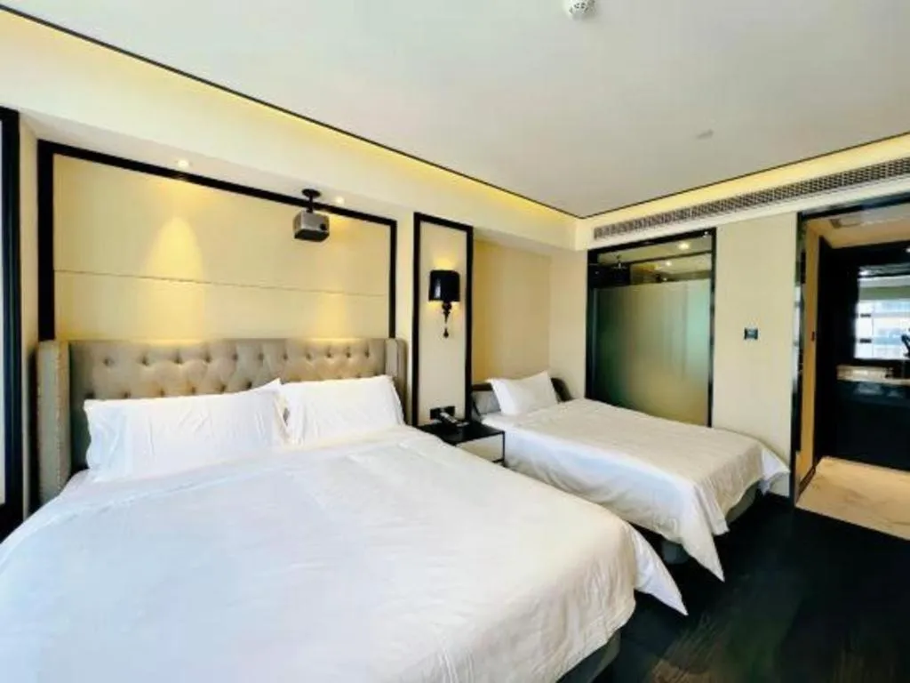 Bed in Xana Hotelle Zhongshan Bus Terminal Fuhuang Road Tianyuecheng