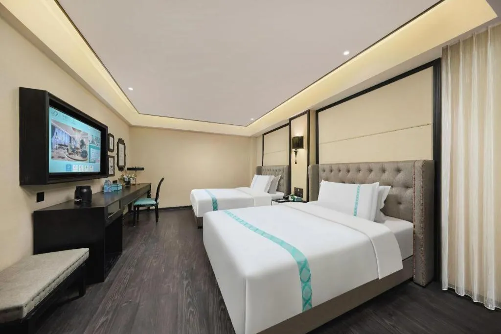 Bed in Xana Hotelle Zhongshan Bus Terminal Fuhuang Road Tianyuecheng