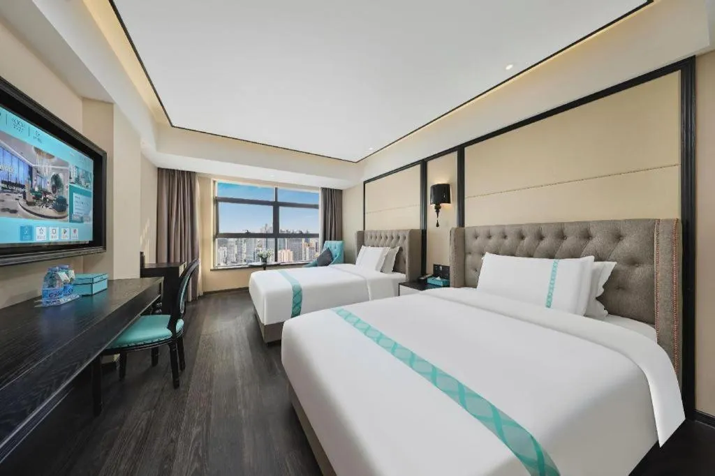 Bed in Xana Hotelle Zhongshan Bus Terminal Fuhuang Road Tianyuecheng