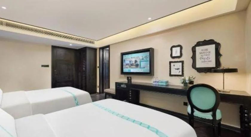 Bed in Xana Hotelle Zhongshan Bus Terminal Fuhuang Road Tianyuecheng