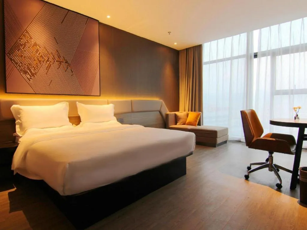 Bed in IU Hotel Chongqing Airport T3 Terminal