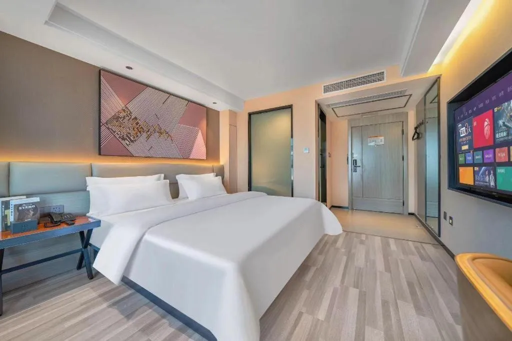 Bed in IU Hotel Chongqing Airport T3 Terminal