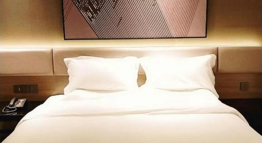 Bed in IU Hotel Chongqing Airport T3 Terminal