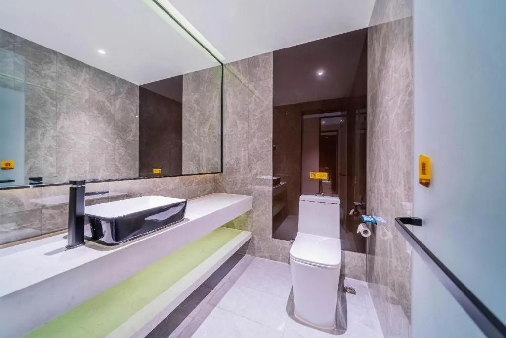 Bed in IU Hotel Chongqing Airport T3 Terminal